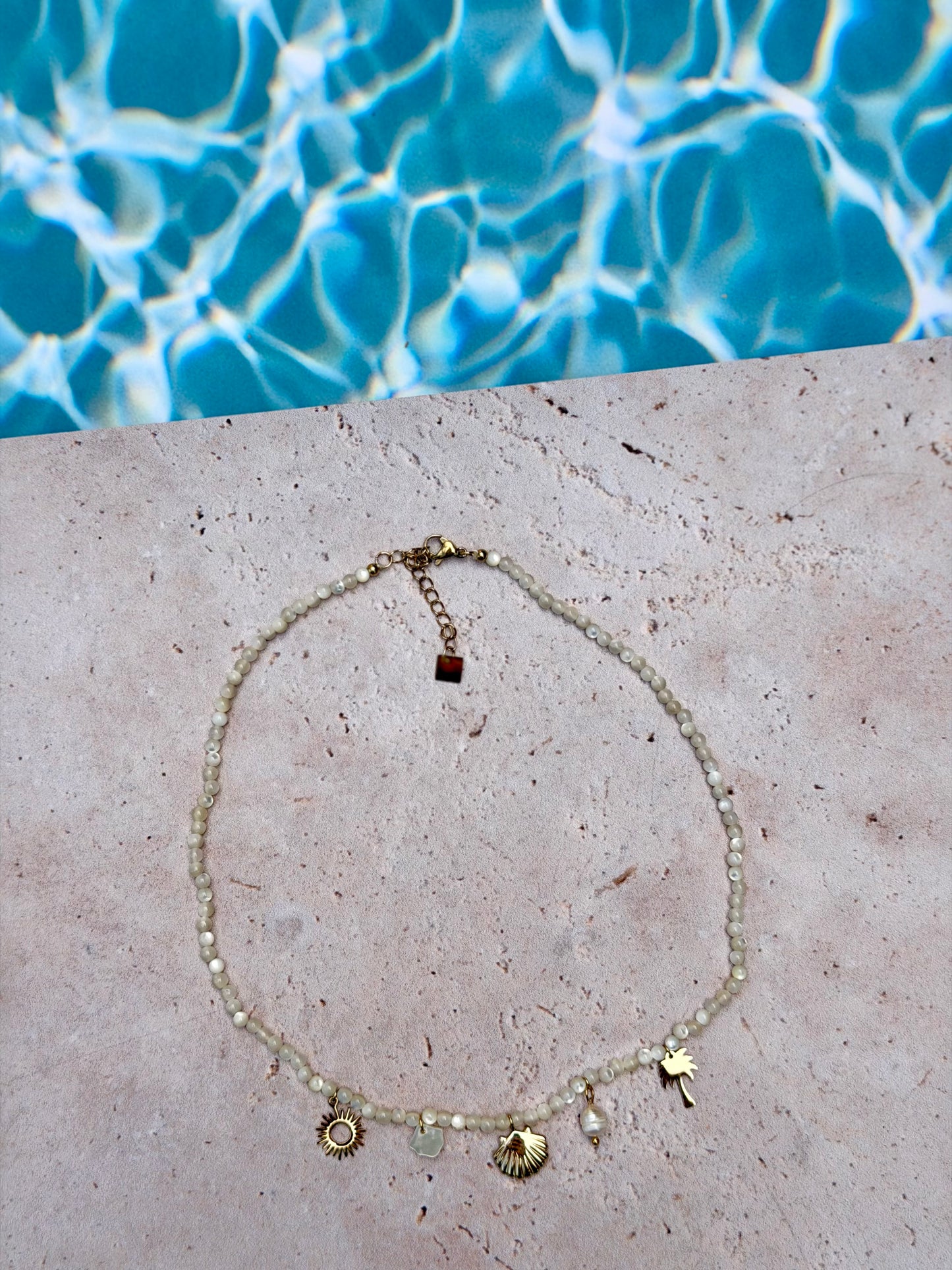 Collier Palm blanc đ